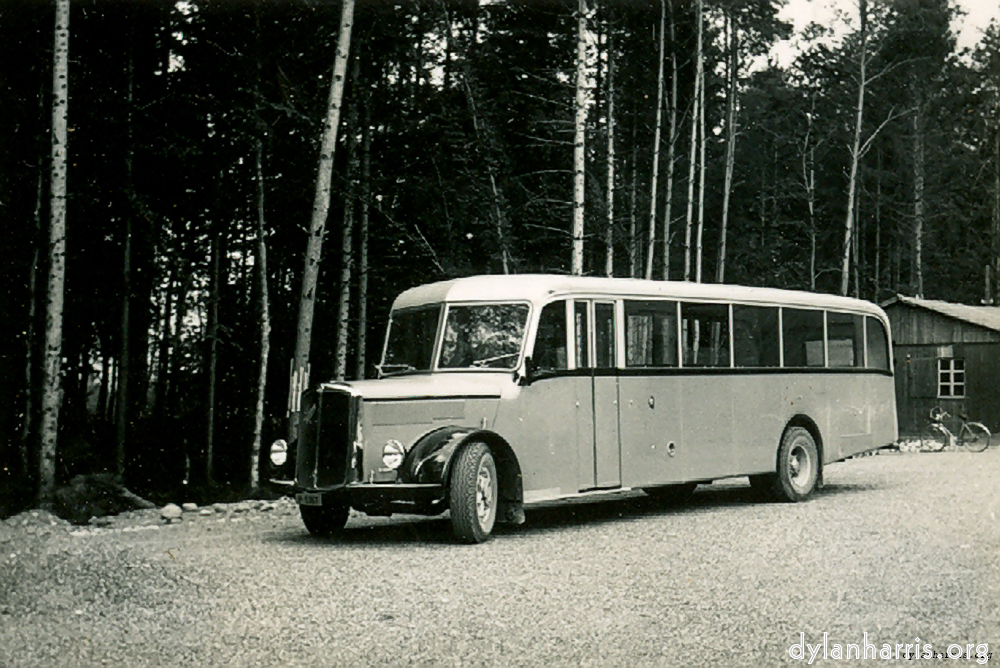image: One of the new Swiss Post Office (P.T.T.) Alpine buses, on arrive at Beznau.