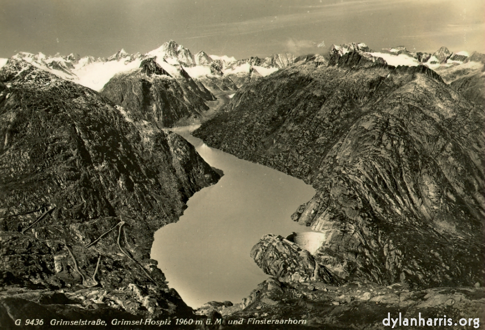 image: Postcard: G 9436 Grimselstra&beta;e, Grimsel Hospiz 1960m &uuml;. M und Finsteraarhorn [[ The Grimsell Hospice, 6,450 feet and Grimsell Lake. ]]