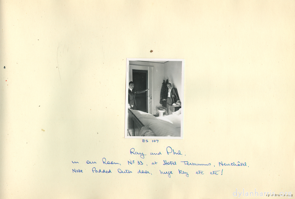 image: Ray and Phil in our Room, No. 33, at Hotel Terminus, Neuch&acirc;tel. Note Padded Outer door, huge key, etc., etc.!