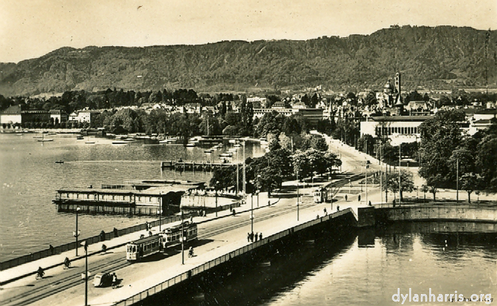 image: The Quaibridge with the Uetliberg behind.